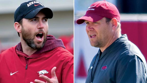 Former Arkansas offensive coordinator Kendal Briles and former defensive coordinator Barry Odom. Briles left for TCU, Odom became head coach at UNLV.
